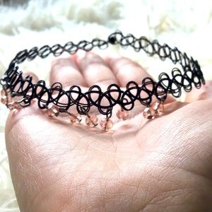 choker it is not Tight but it does depend on Your neck! There are 12 pink beads